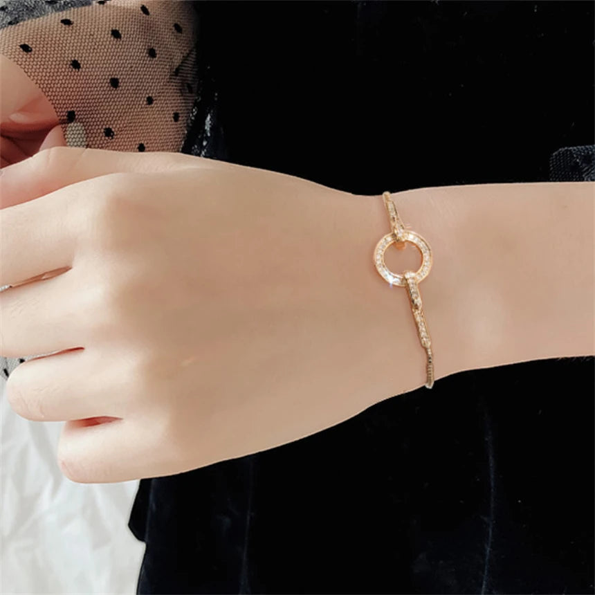 Gold Circular Interlock Cubic Zirconia Drawstring Adjustable Chain Bracelet