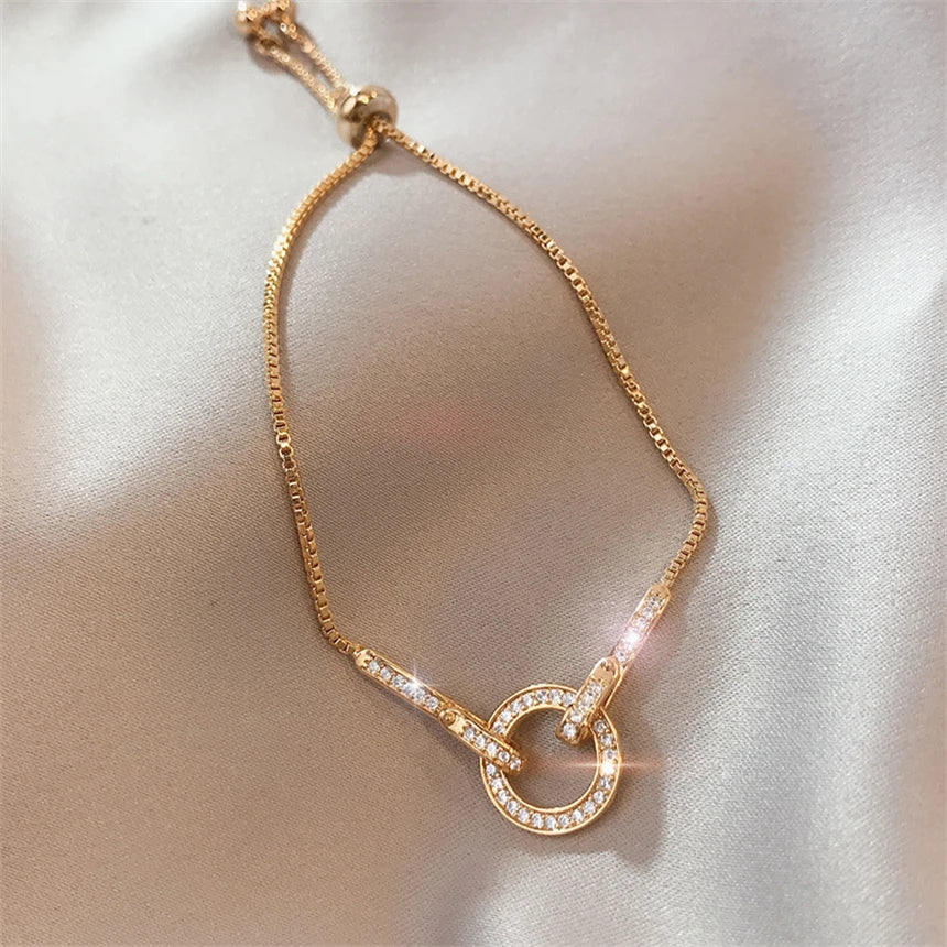 Gold Circular Interlock Cubic Zirconia Drawstring Adjustable Chain Bracelet